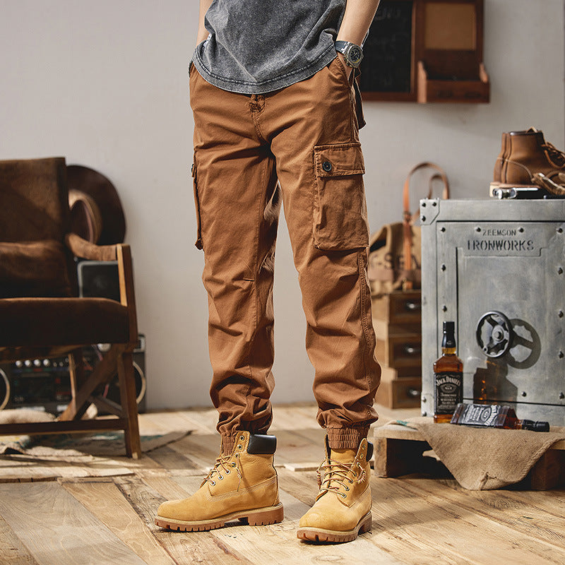 Men's robustly constructed cargo pants in jogger style with drawstring waistband, flap pockets, and elastic ankle cuffs Mune Fashion