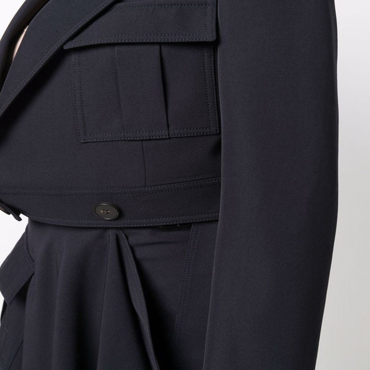 Women's short blazer in tailoring with patch pockets and distinctive shoulder design Mune Fashion