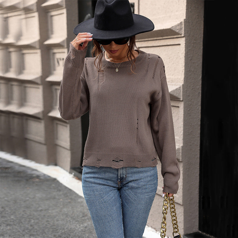 Women’s oversized knitted sweater in destroyed look with round neckline Mune Fashion