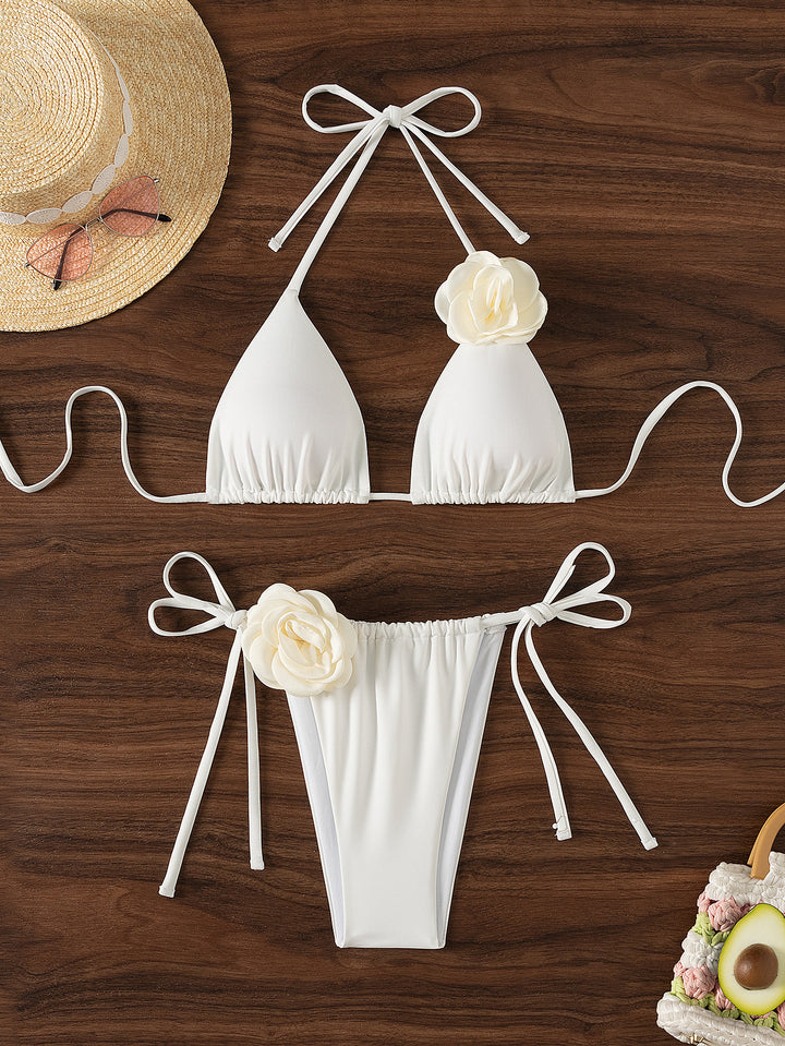 Ladies triangle bikini with playful flower appliques Mune Fashion