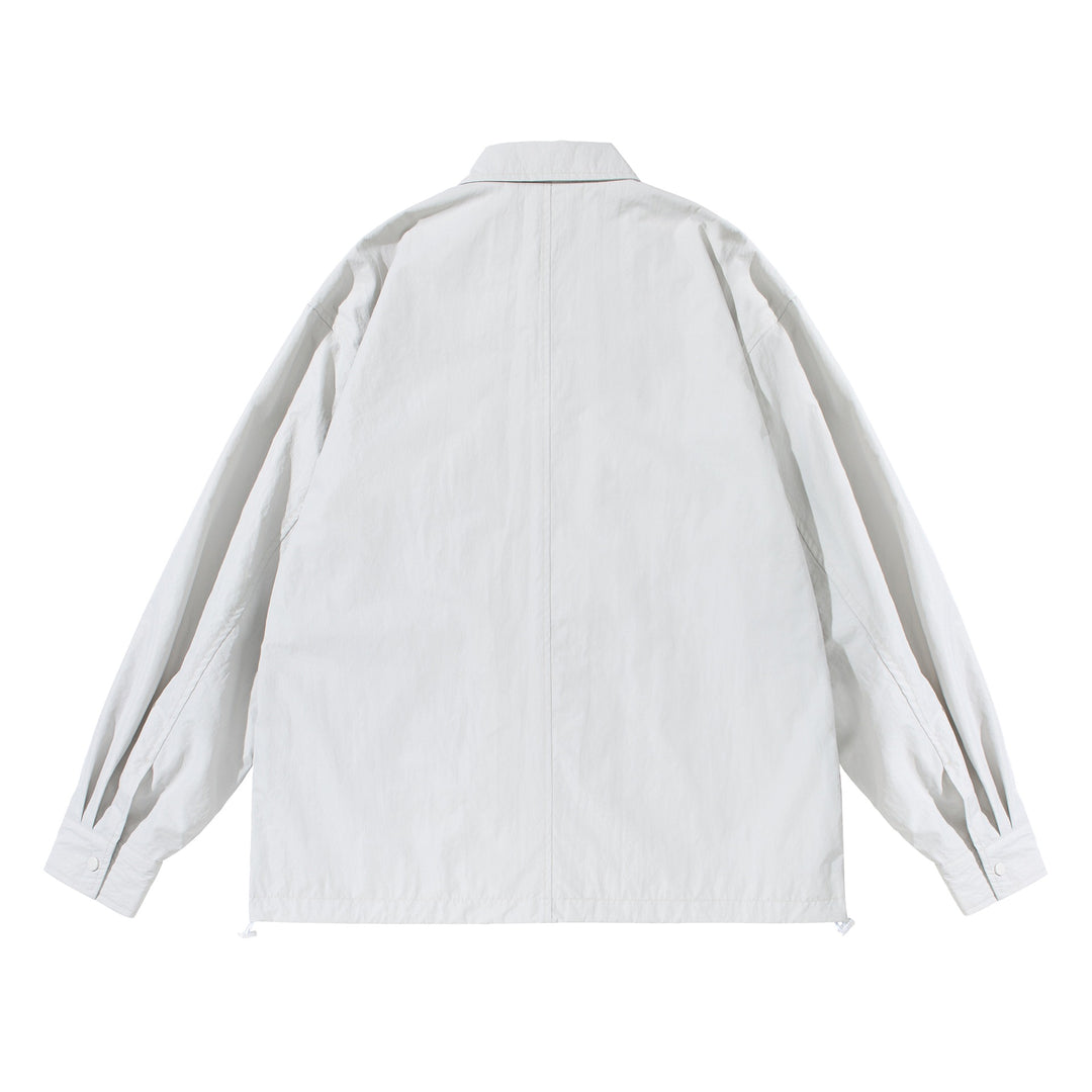 Unisex Oversize shirt jacket with snap button placket and flap pockets Mune Fashion