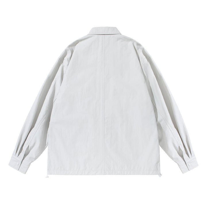 Unisex Oversize shirt jacket with snap button placket and flap pockets Mune Fashion