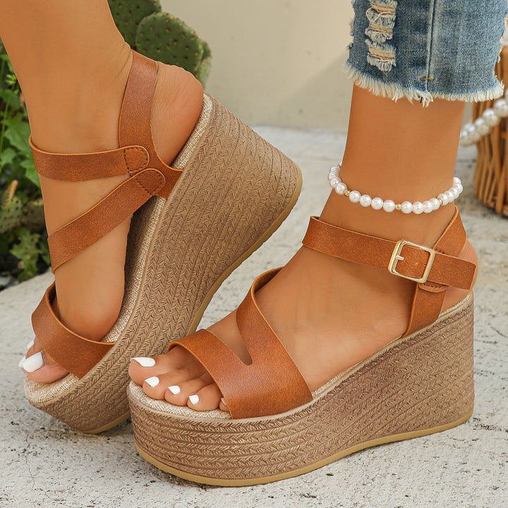 Women's wedge slide with braided jute wedge, crossed straps, adjustable buckle tab, and padded footbed Mune Fashion