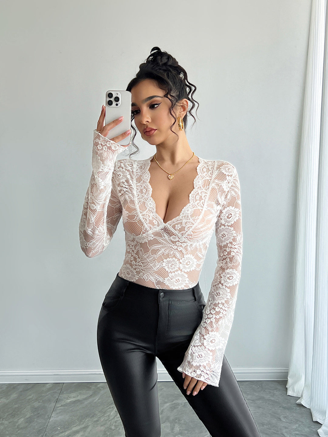 Ladies tailored lace shirt with deep V-neck, floral net lace and long sleeves Mune Fashion