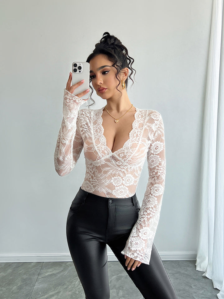 Ladies tailored lace shirt with deep V-neck, floral net lace and long sleeves Mune Fashion