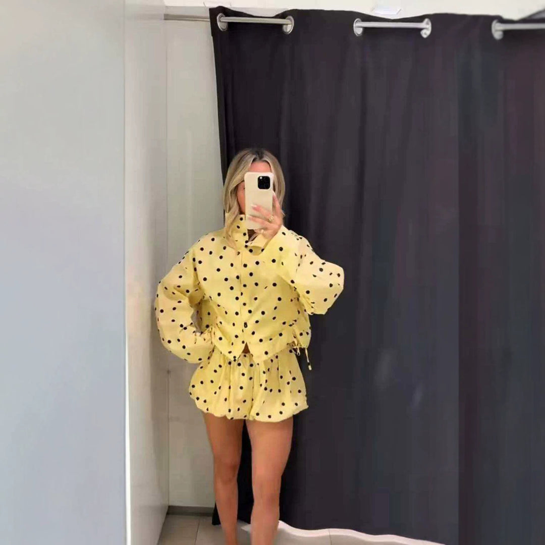 Ladies short cut dotted rain jacket with stand-up collar, snap button placket and drawstring Mune Fashion