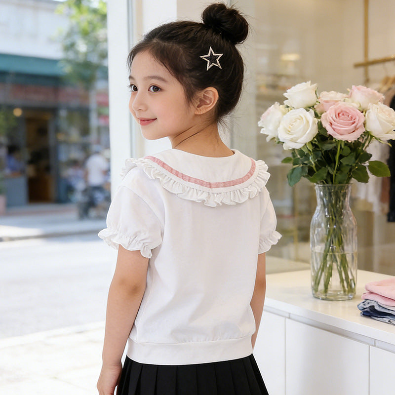 Girl's blouse with ruffle details and decorative collar Mune Fashion