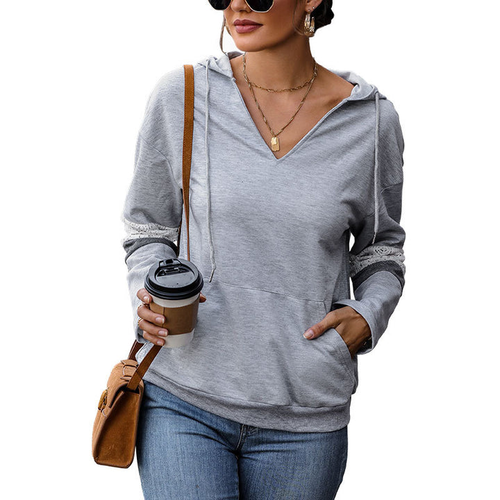 Women's hooded sweater with V-neck, kangaroo pocket, and contrasting sleeves Mune Fashion