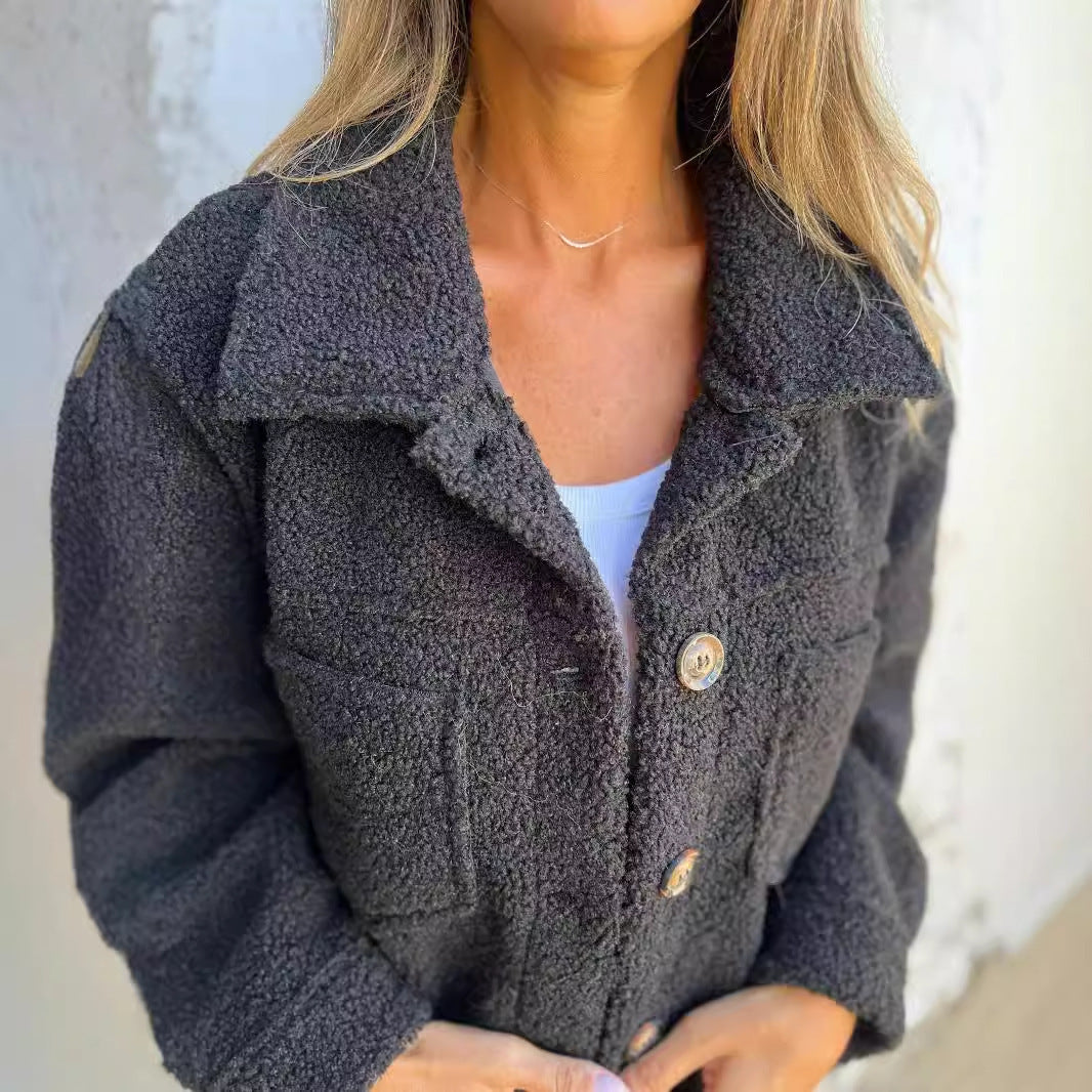 Ladies teddy jacket with large lapel collar, continuous button placket, and patch pockets Mune Fashion
