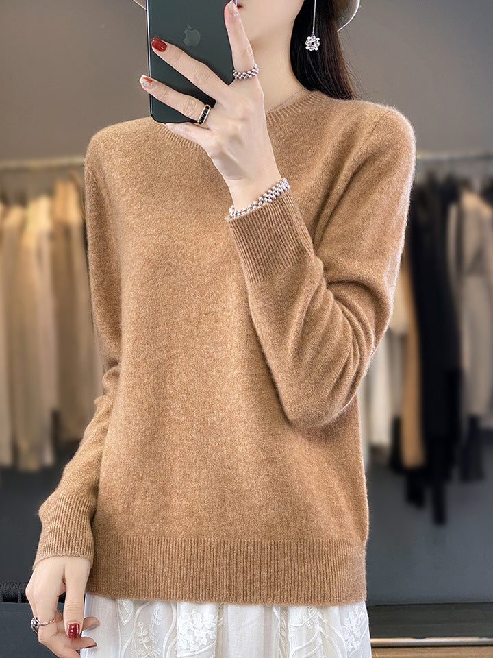 Ladies luxurious fine knit round neck sweater with soft fluffy finish and narrow cuff shape Mune Fashion