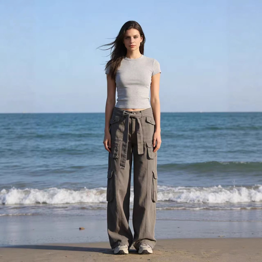 Women's loose cargo trousers with high waist, tie belt and multiple flap pockets Mune Fashion