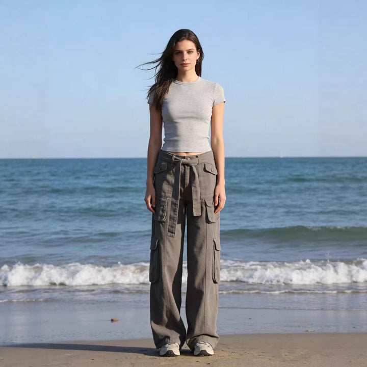 Women's loose cargo trousers with high waist, tie belt and multiple flap pockets Mune Fashion