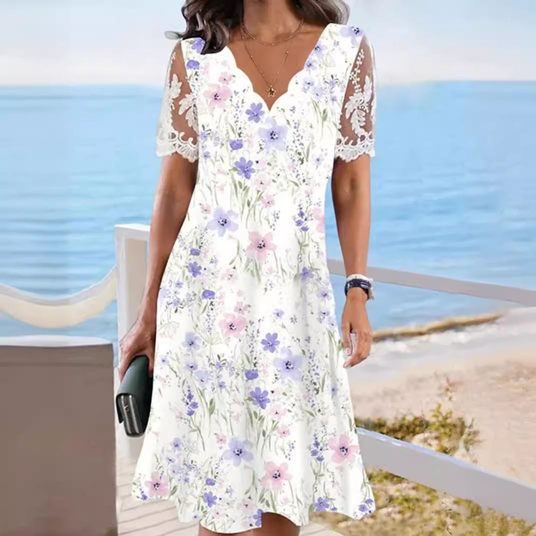 Women's A-line midi dress with wavy V-neck, all-over floral pattern and transparent lace sleeves Mune Fashion