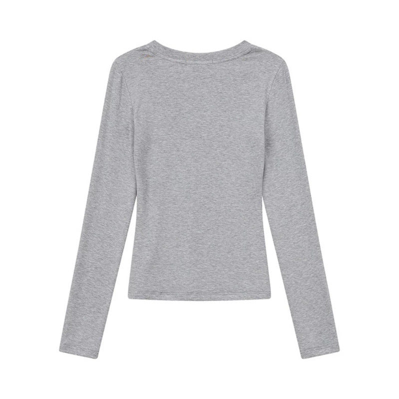 Women's long sleeve shirt with V-neck and fitted slim-fit style