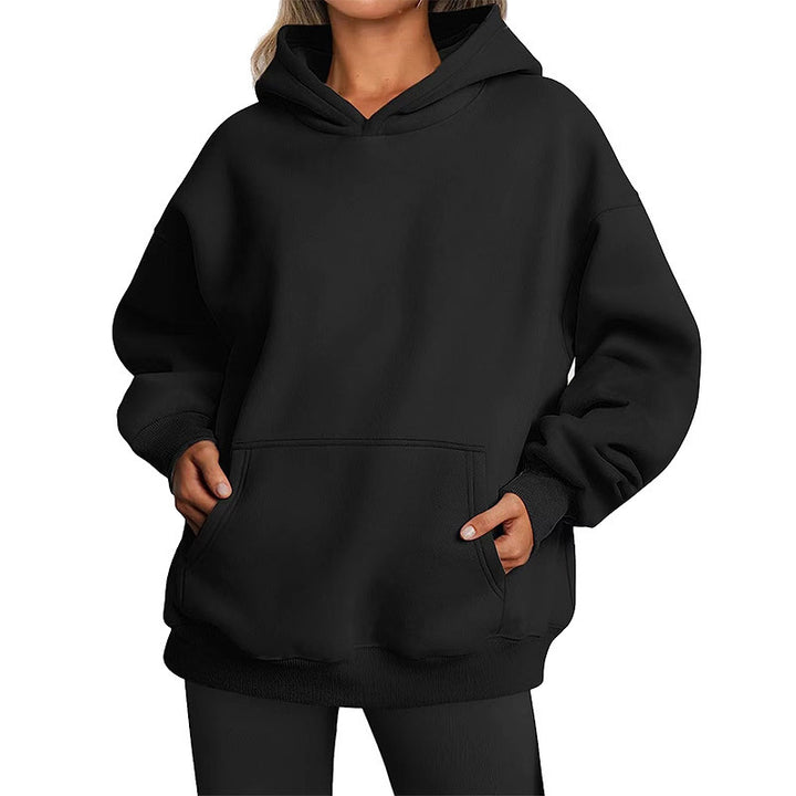 Women's oversized hooded sweatshirt with raglan sleeves, kangaroo pocket and soft fleece lining Mune Fashion