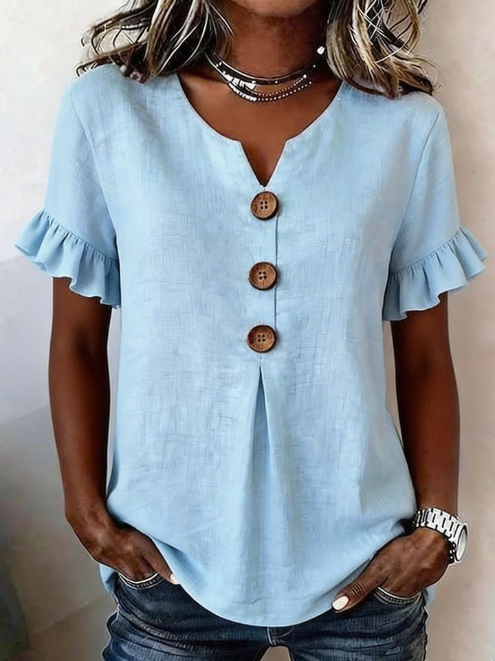 Women's top with ruffled hems and button details Mune Fashion