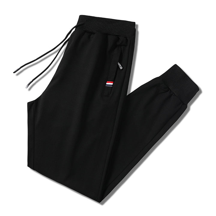 Men's Slim-Fit Jogging Pants with Elastic Ribbed Waistband, Drawstring and Zipper Pockets Mune Fashion