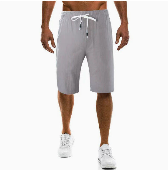 Men's light linen pants with elastic waistband, wide leg, and side pockets Mune Fashion