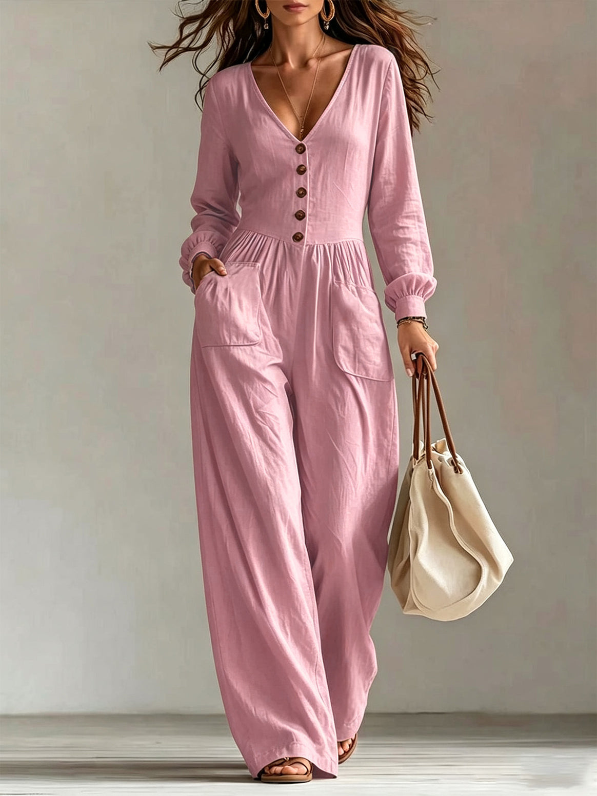 Ladies linen jumpsuit with V-neck, button placket and wide leg cut Mune Fashion