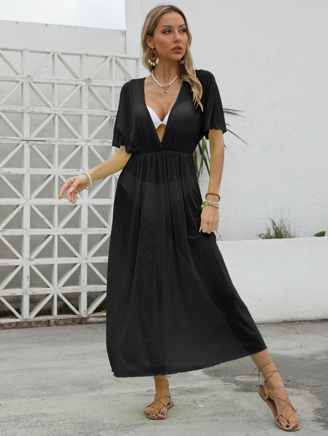 Women elegant maxi dress with deep V-neck and flowing skirt Mune Fashion