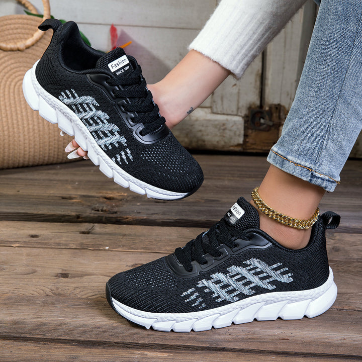 Women's knitted slip-on sneakers with elastic shaft, decorative lacing, and segmented cushioning sole Mune Fashion