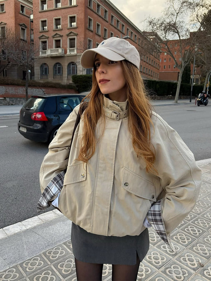 Women’s short bomber jacket with stand-up collar, chin strap, and checkered sleeve lining Mune Fashion
