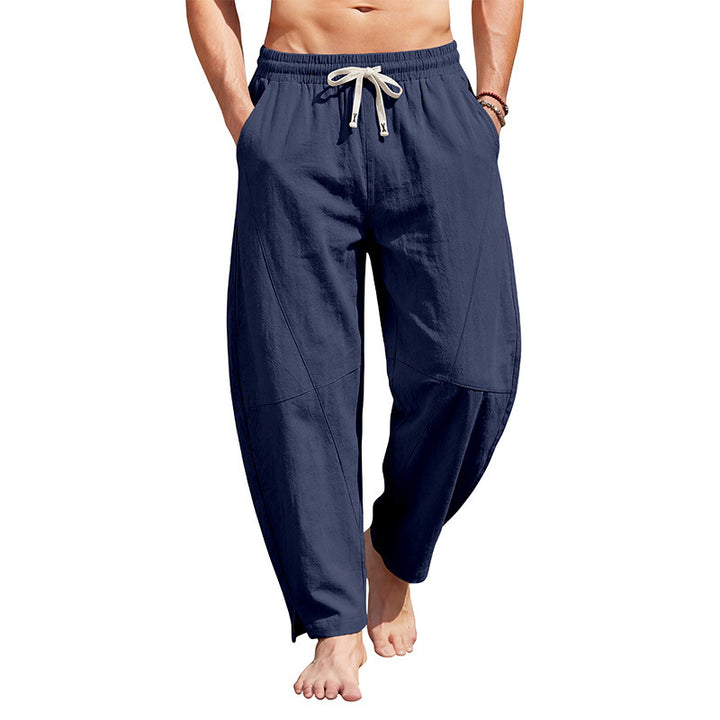 Men's ankle-length casual trousers made of linen blend with elastic drawstring waistband and side slits.