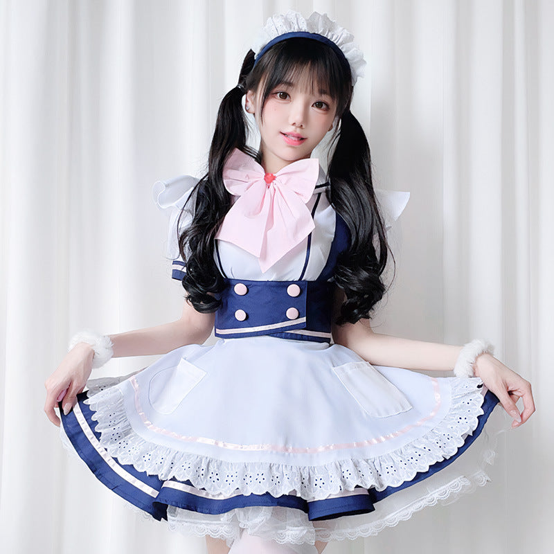 Ladies' costume dress in playful maid style with ruffles and bow details Mune Fashion