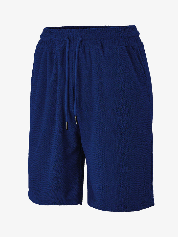 Men's terry shorts with herringbone texture, elastic drawstring waistband, and side pockets Mune Fashion