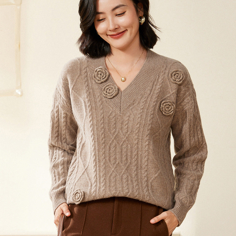 Women's cable knit V-neck sweater with three-dimensional floral appliqués made from soft wool blend Mune Fashion