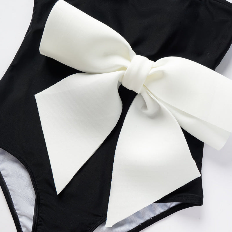 Ladies one-piece swimsuit with elegant bow appliqué Mune Fashion