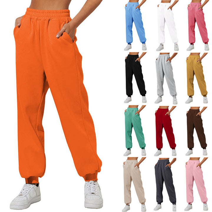 Women's relaxed high-waist jogging pants with double-layer comfort waistband, side pockets, and gathered ankle cuffs Mune Fashion