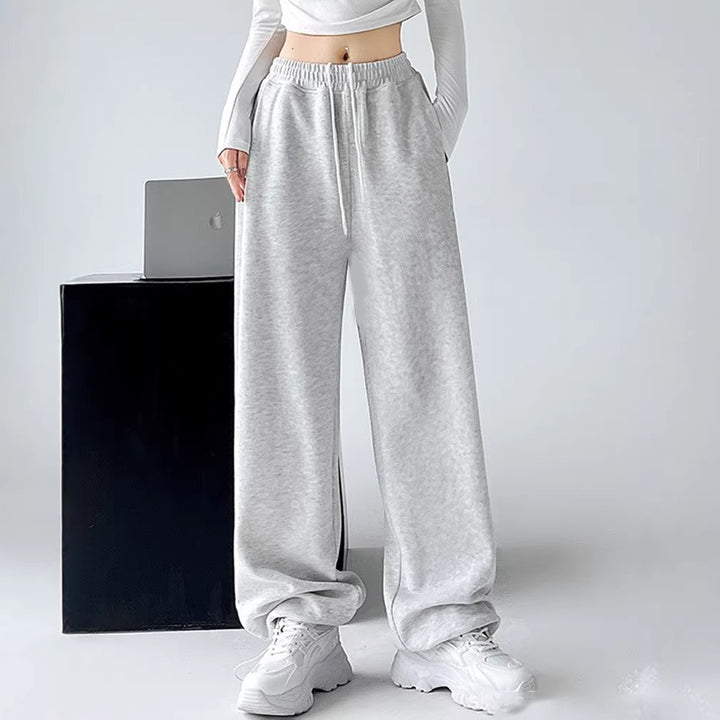 Ladies Nan extra wide palazzo sweatpants with high comfort waistband, side pockets, slit at hem and drawstring Mune Fashion