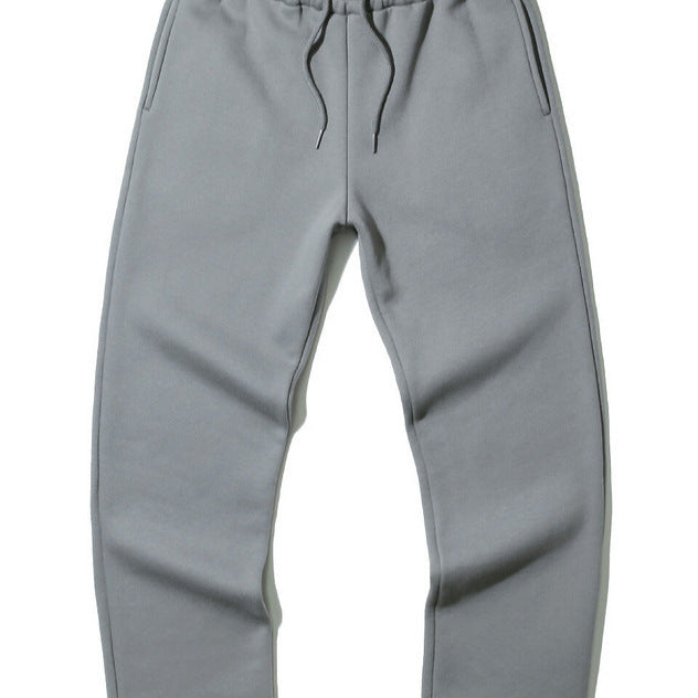 Unisex modern Relax Jogging pants with elastic drawstring waistband, side pockets, and tapered leg Mune Fashion