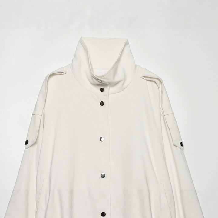 Women's oversized short jacket with high stand-up collar, snap button front, and patch arm pocket Mune Fashion