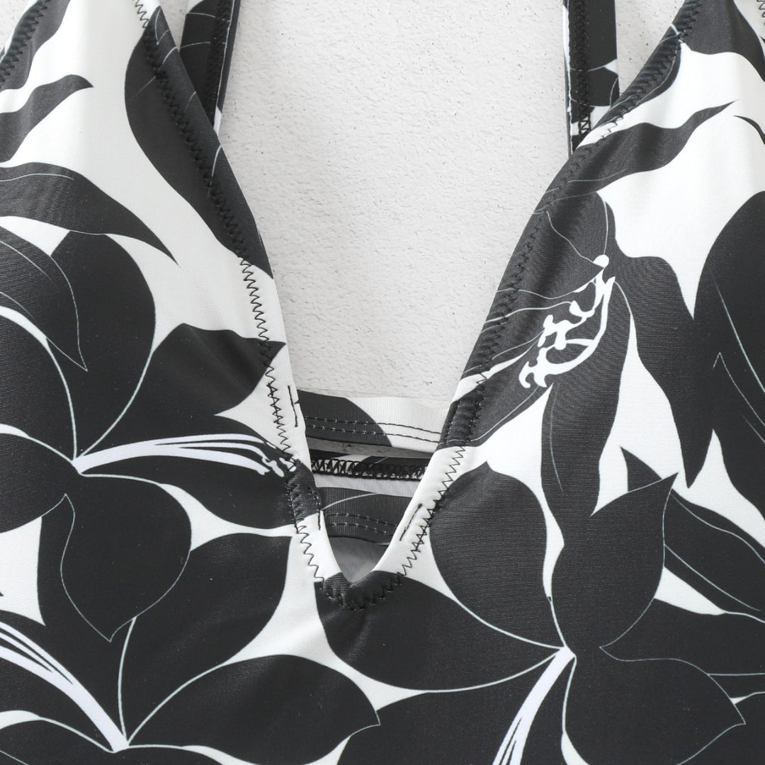 Women's one-piece bathing suit with elegant floral design and modern V-neck Mune Fashion