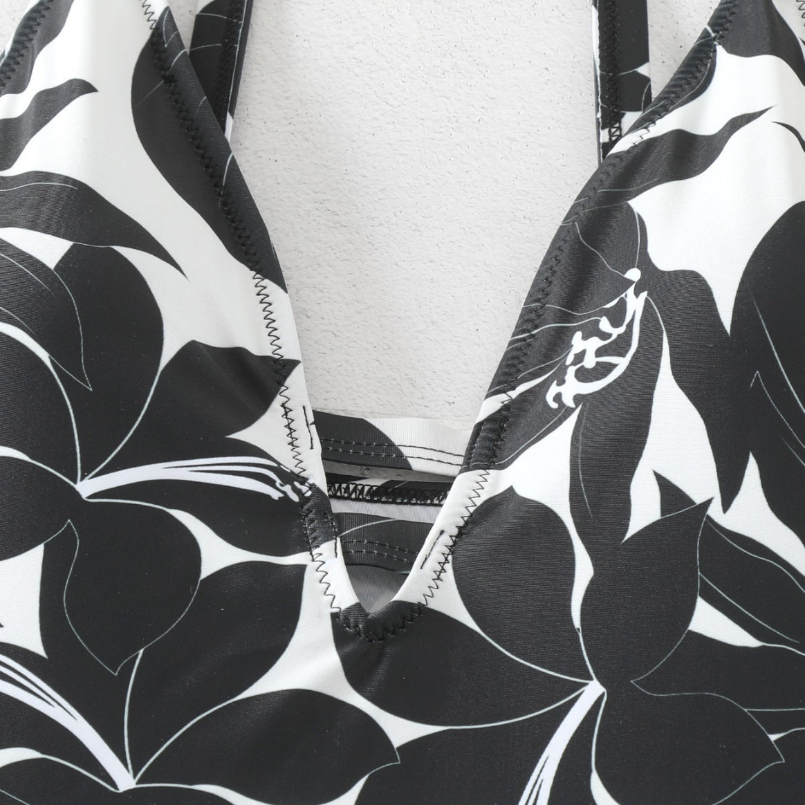 Women's one-piece bathing suit with elegant floral design and modern V-neck Mune Fashion
