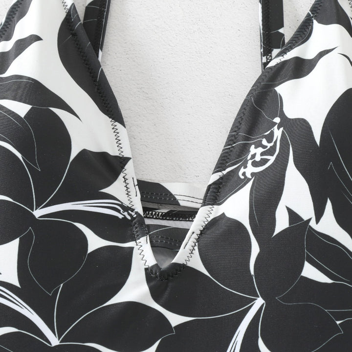 Women's one-piece bathing suit with elegant floral design and modern V-neck Mune Fashion