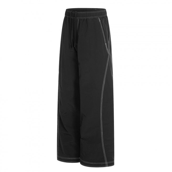 Women's wide pants with elastic waistband, drawstring and contrasting decorative seams Mune Fashion