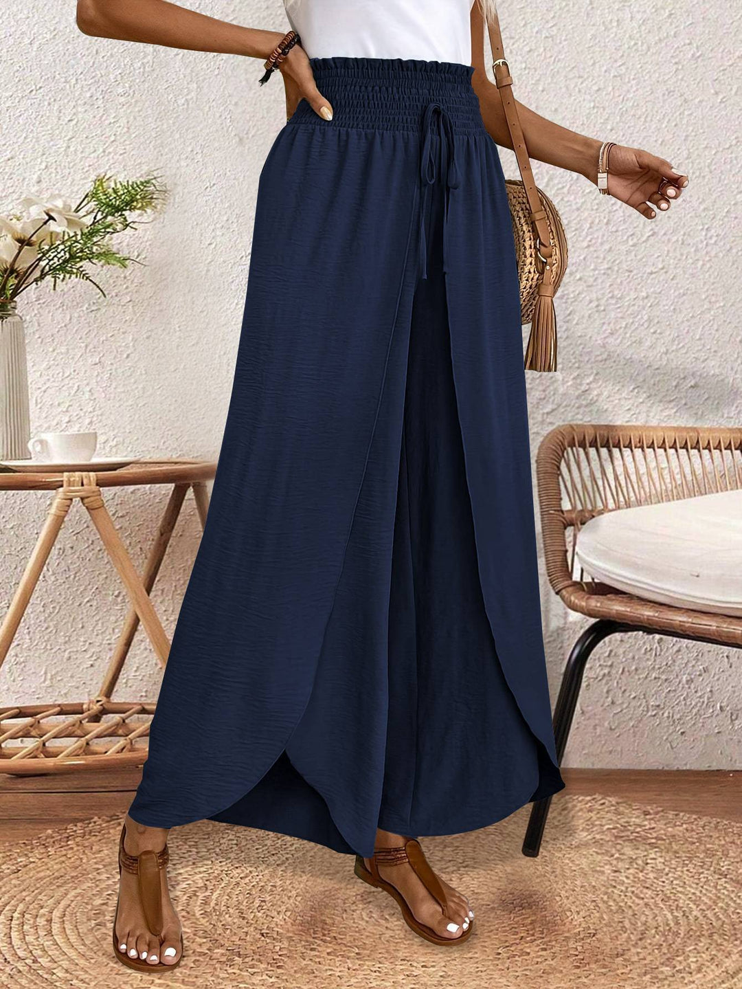 Ladies nan wrap maxi skirt with high smocked waistband and integrated palazzo pants lining Mune Fashion