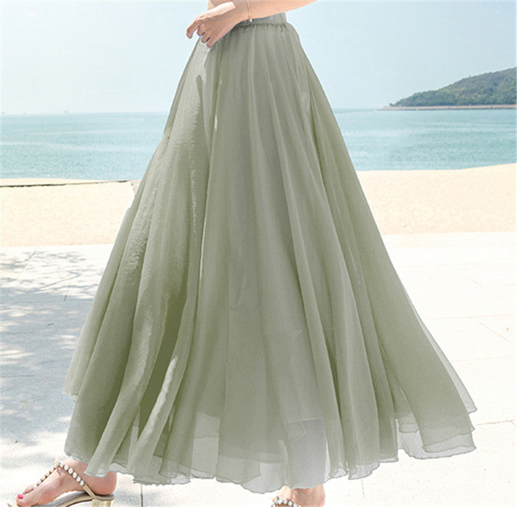 Women's flowing maxi skirt made of chiffon with elastic waistband and layered ruffle Mune Fashion