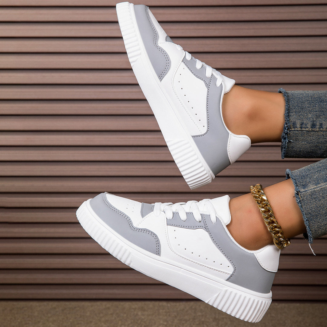 Women low-cut sneakers with ribbed tread, padded collar, and perforated upper material Mune Fashion