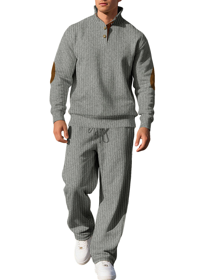 Men's fine ribbed sweater with half button placket, high stand-up collar, and contrasting suede elbow patches Mune Fashion