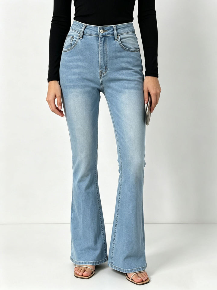 Ladies high-waisted jeans with a narrow hip area and wide flare with elastic waistband Mune Fashion