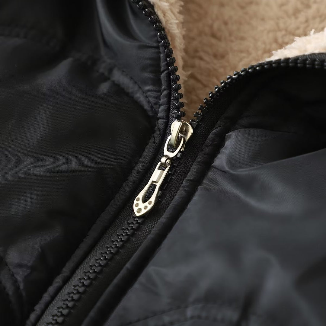Ladies' quilted hooded jacket with teddy lining, full zipper and side pockets Mune Fashion