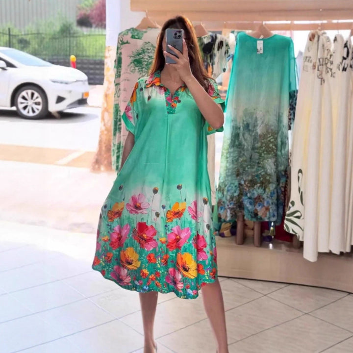 Women's lightweight shirt dress with floral border print, open V-neck and side pockets Mune Fashion