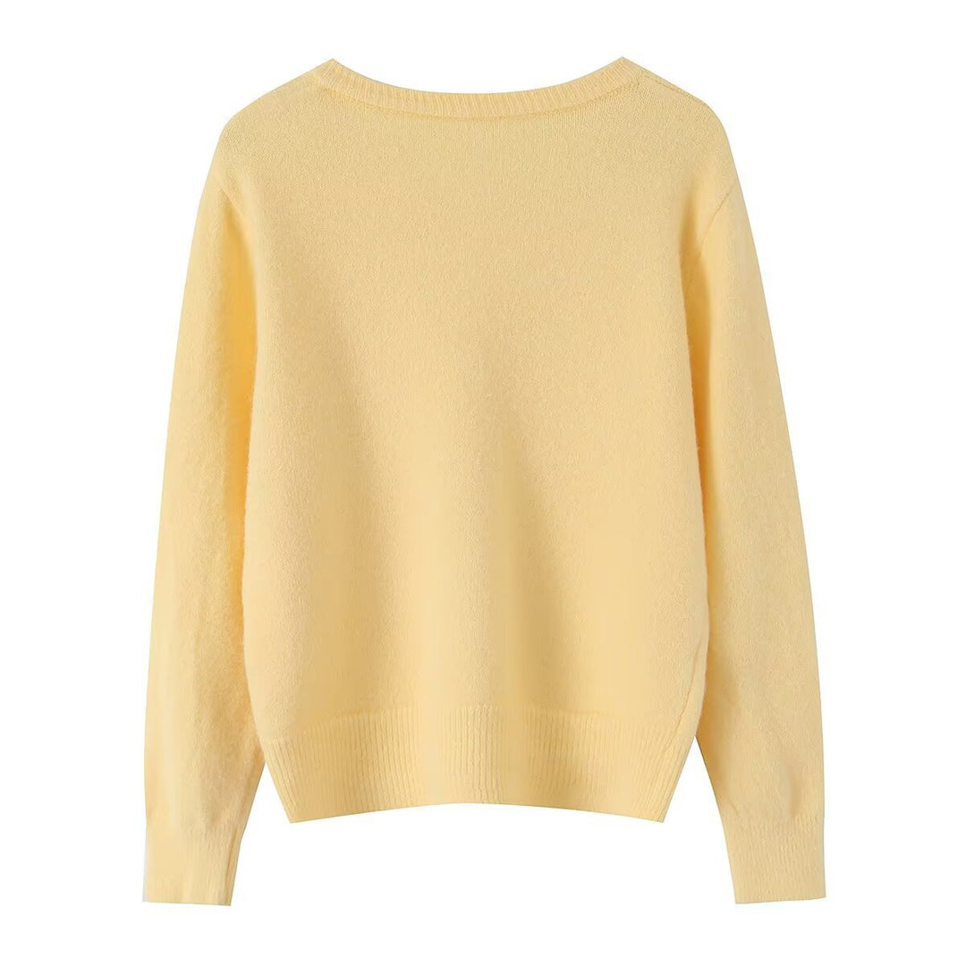 Women's lightweight fine knit cardigan with round neck, ribbed cuffs, and pearl buttons Mune Fashion