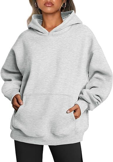 Women's oversized hooded sweatshirt made of soft cotton blend with kangaroo pocket Mune Fashion