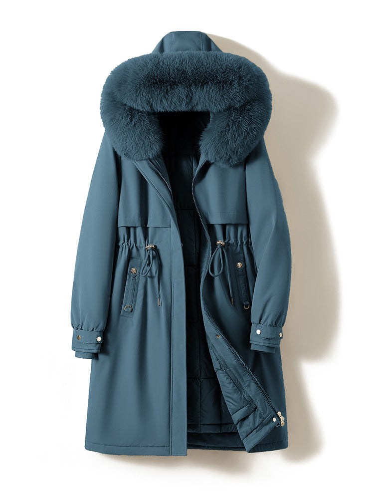 Women's longer water-repellent parka with voluminous faux fur hood, adjustable drawstring waist, and quilted thermal inner jacket Mune Fashion