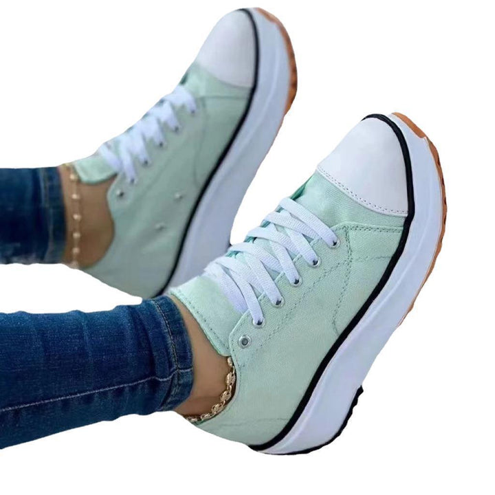 Women’s canvas platform sneaker with robust tread sole, toe cap, and lacing Mune Fashion